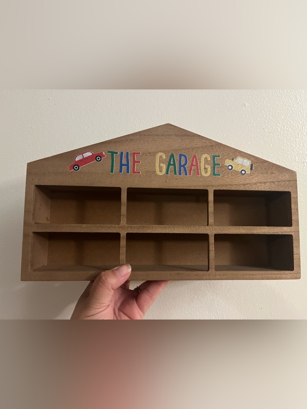 Wooden toy car hanging garage